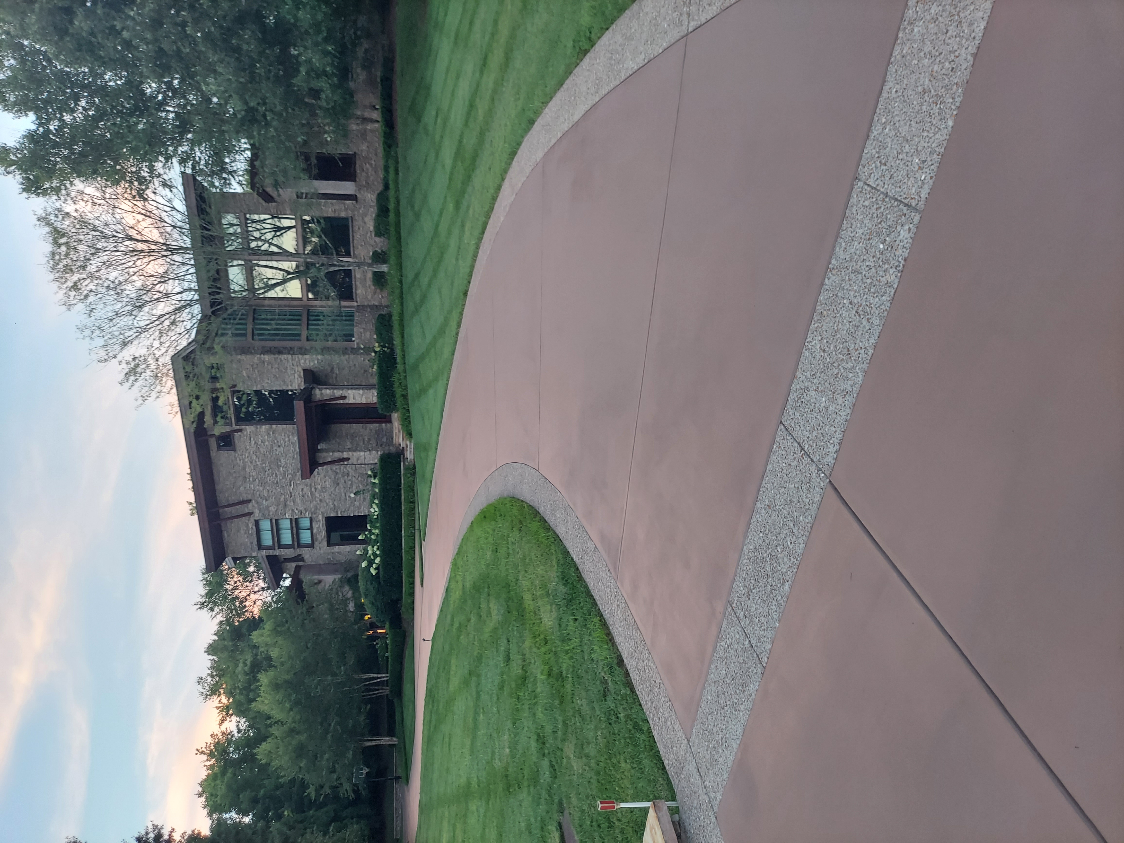 A driveway leading to a house